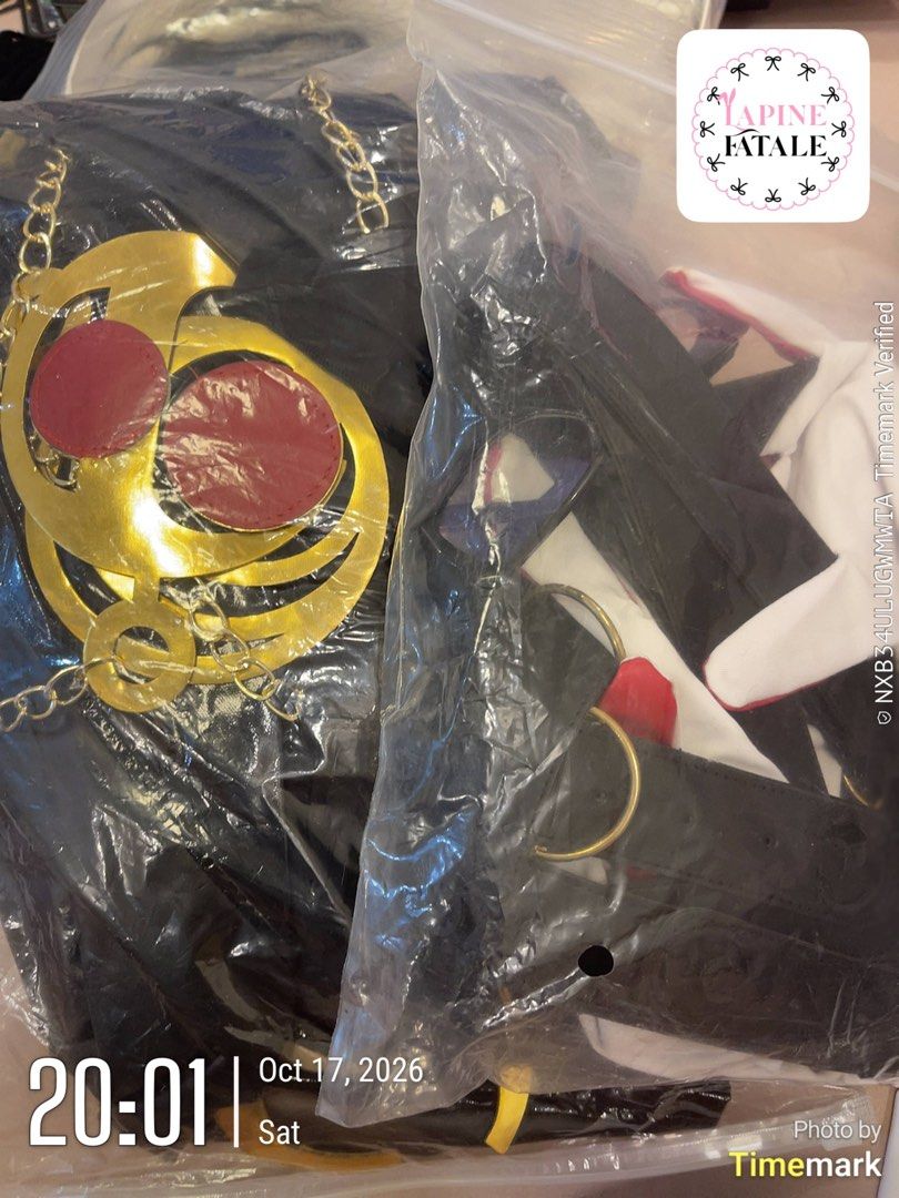 Bayonetta Cosplay Plus size 3XL (Category: Sets or Coordinates) located in Bacolod City. Submitted by mariowos (Listing ID 1470699471, Image 1). Description: - Complete cosplay outfit ready for your next convention or event - Includes white garment sections, black straps, and distinct gold decorative pieces with red circles - Carefully stored and packed inside protective plastic bags - Complete set, no missing pieces.
