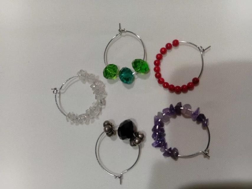 Beaded / crystal gemstone wire hoop earrings [new] (Category: Earrings) located in Caloocan City. Submitted by mma_222 (Listing ID 1470599504, Image 1). Description: - Brand new handmade wire hoop earrings - Features clear crystals, green faceted beads, red beads, black beads, and purple amethyst chips - Silver-tone metal with secure clasp closures - Lightweight and colorful statement pieces - Perfect for daily wear and easy to mix and match.