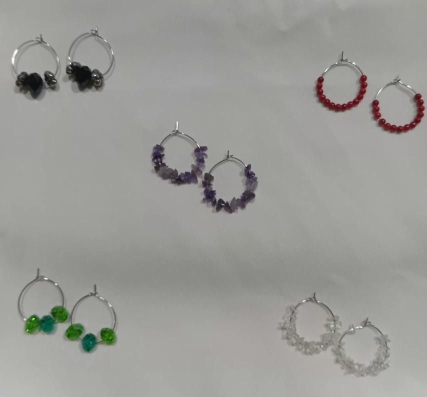 Beaded / crystal gemstone wire hoop earrings [new] (Category: Earrings) located in Caloocan City. Submitted by mma_222 (Listing ID 1470599504, Image 2). Description: - Brand new handmade wire hoop earrings - Features clear crystals, green faceted beads, red beads, black beads, and purple amethyst chips - Silver-tone metal with secure clasp closures - Lightweight and colorful statement pieces - Perfect for daily wear and easy to mix and match.