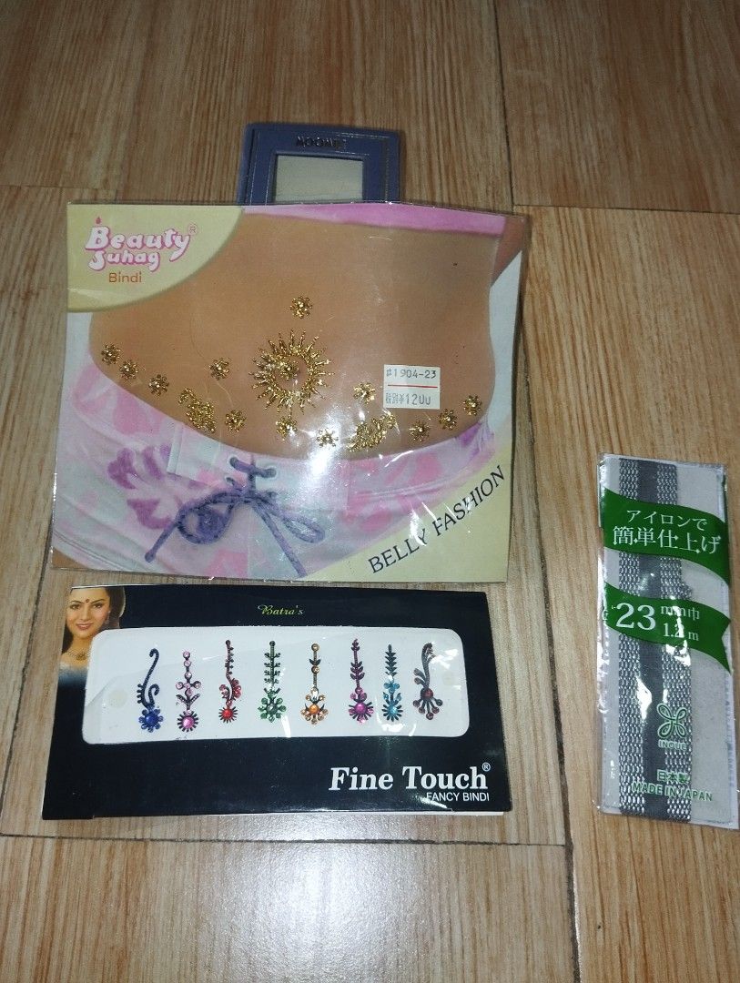Beauty Suhag Bindi and Fine Touch Bindi Sets (Category: Makeup) located in Pasig City. Submitted by cityshopperph (Listing ID 1470599032, Image 2). Description: - Brand new, unopened, and unused decorative stickers and bindis - Includes Beauty Suhag belly fashion bindi - Includes Batra's Fine Touch multi-colored stone bindi pack - Includes a blue bajubandh arm sticker - Includes an Inque iron-on tape strip - Ideal for parties, traditional events,