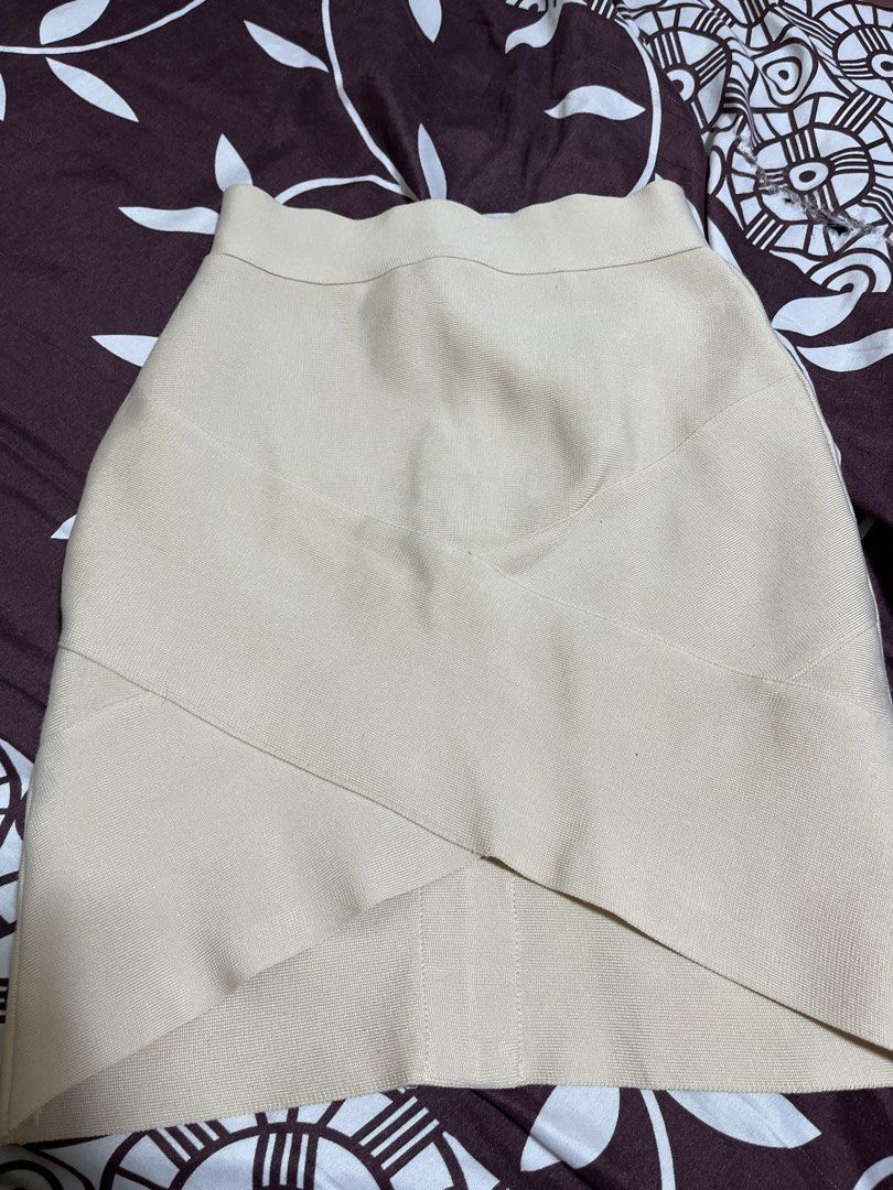 Beige bandage wrap mini skirt (Category: Skirts) located in Manila. Submitted by elocin_0428 (Listing ID 1470566457, Image 1). Description: Beige bandage skirt with a stretchy material that hugs curves nicely..