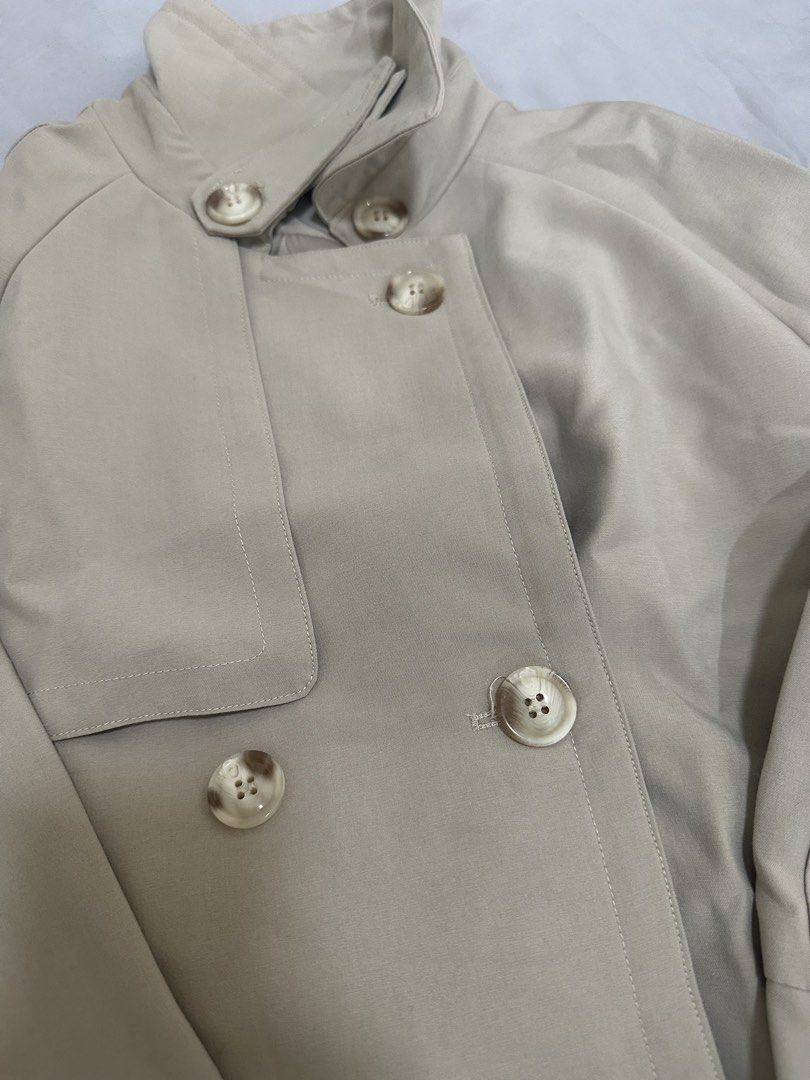 Beige trench coat (Category: Coats, Jackets and Outerwear) located in Pasig City. Submitted by shopmystuff.p (Listing ID 1470740786, Image 3). Description: Good as new Used once for my AU trip Can fit small to medium.
