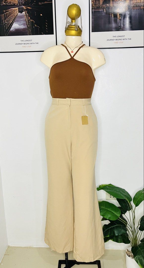 Beige Trouser Pants | Size 29-30 (Category: Jeans) located in Manila. Submitted by bengirlclothing (Listing ID 1470589840, Image 2). Description: - Color: Classic beige - Size: 29-30 inches -Length: 41 inches - Style: High-waisted wide-leg trousers - Fit & Comfort: Super comfy stretchy fabric, clean front waistband with belt loops, and two back welt pockets .