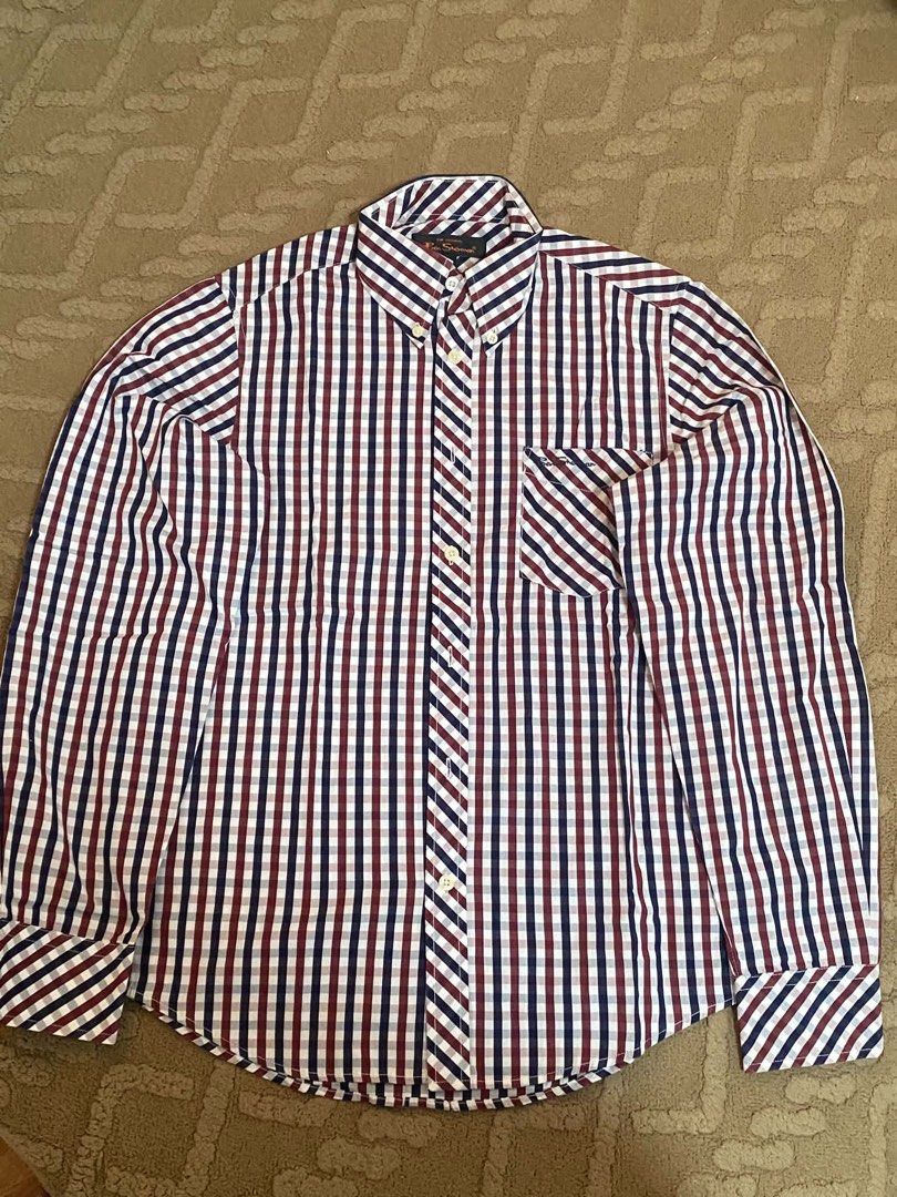 Ben Sherman Plaid Long Sleeve Button-Down Shirt Size S (Category: Formal Shirts) located in Manila. Submitted by judiec29 (Listing ID 1470599726, Image 3). Description: - Brand: Ben Sherman - Style: Long sleeve button-down shirt - Design: Classic plaid pattern in blue, white, and red - Size: Small - Features: Button-down collar, single chest pocket with embroidered logo shield, lightweight cotton fabric - Condition: Clean, well-kept, and ready to