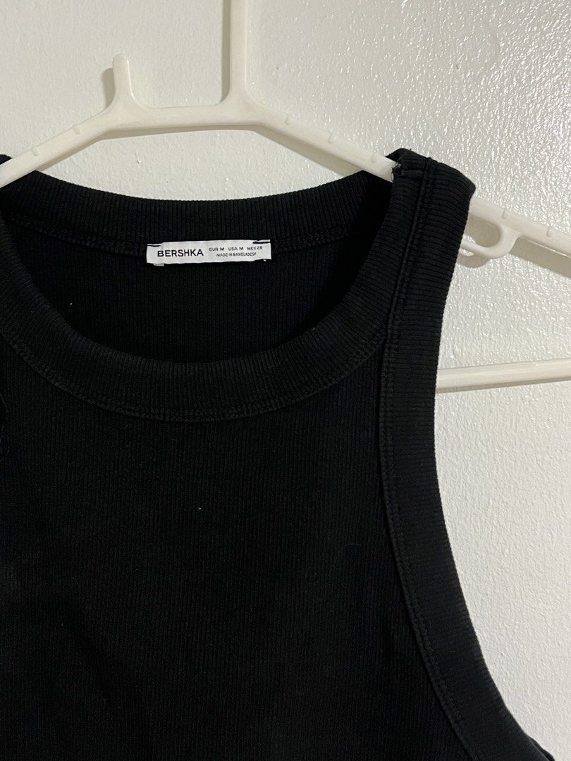 Bershka Black Ribbed Tank Top (Category: Sleeveless) located in Cabuyao City. Submitted by rdtrmt (Listing ID 1470576279, Image 2). Description: - Brand: Bershka - Size: M - Color: Classic Black - Style: Ribbed tank top with racerback cut - Material: Soft, stretchy cotton - Condition: Worn a few times, but still in good condition.