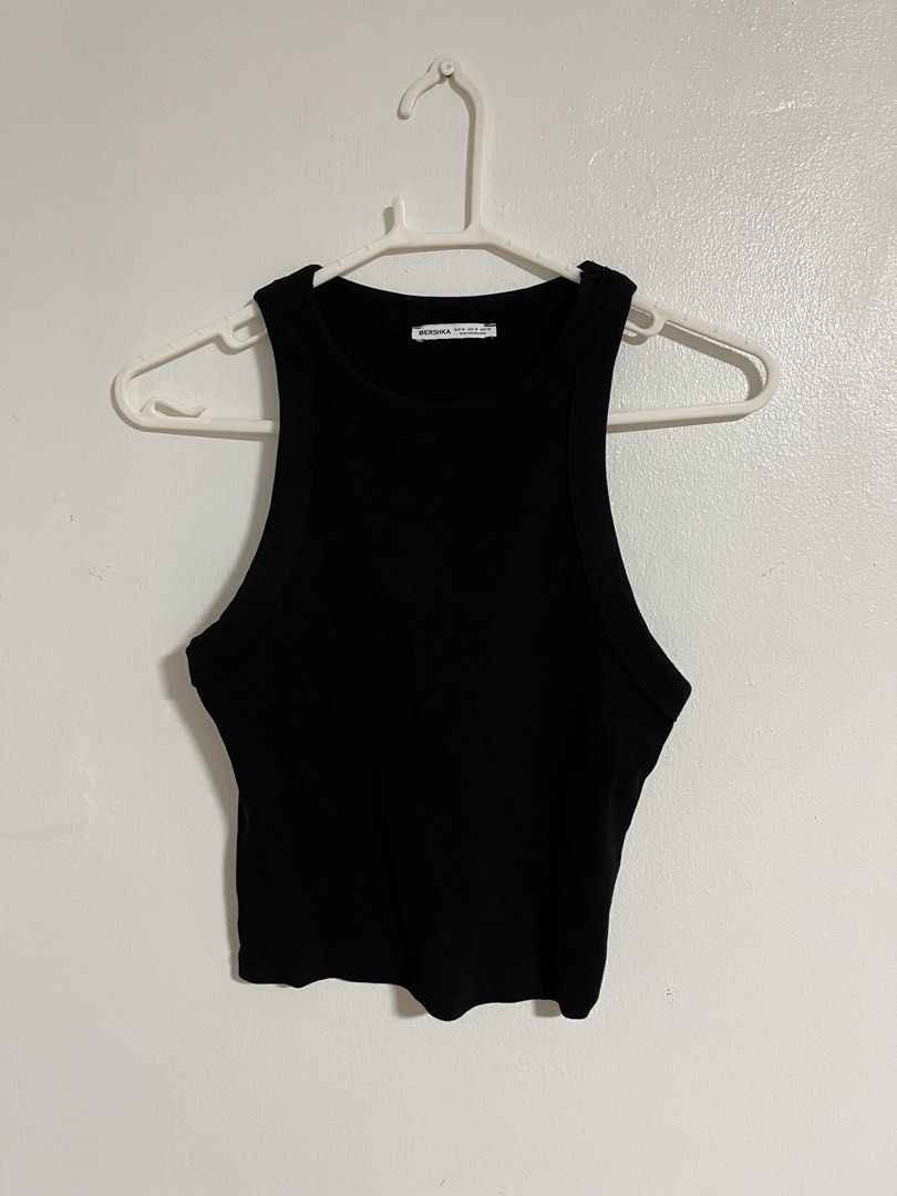 Bershka Black Ribbed Tank Top (Category: Sleeveless) located in Cabuyao City. Submitted by rdtrmt (Listing ID 1470576279, Image 1). Description: - Brand: Bershka - Size: M - Color: Classic Black - Style: Ribbed tank top with racerback cut - Material: Soft, stretchy cotton - Condition: Worn a few times, but still in good condition.