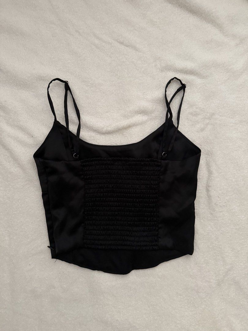 Bershka Black Satin Cropped Cami Top (Category: Others Tops) located in Mandaue City. Submitted by meh.soh (Listing ID 1470608879, Image 3). Description: Bershka Black Satin Cropped Cami Top size: xs on tag used once only original price: 1,695 Mode of Payment: Gcash Delivery: Maxim (within Cebu) j&t (outside Cebu) (df shouldered by buyer) Location: Cubacub, Mandaue.