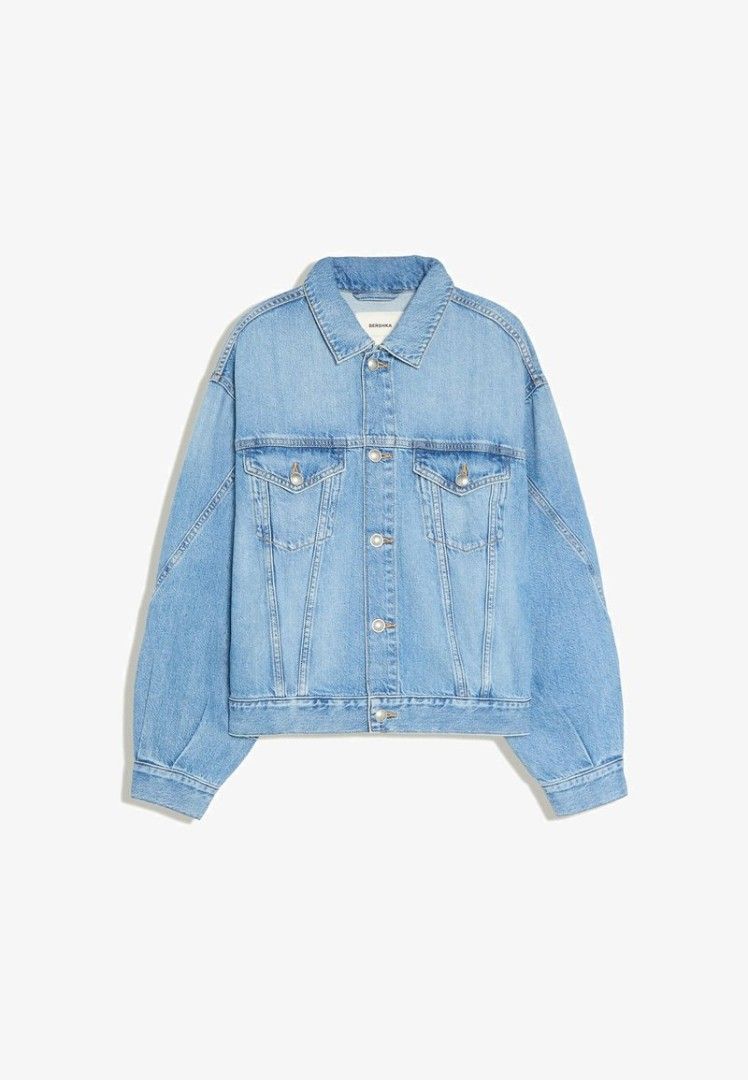 Bershka Denim Jacket Light Blue Size XS (Category: Coats, Jackets and Outerwear) located in Quezon City. Submitted by epoquebyjaz (Listing ID 1470640221, Image 1). Description: - Brand: Bershka - Size: EUR XS / USA XS / MEX 24 - Color/Wash: Light wash denim - Fit: Relaxed fit with structured collar - Features: Classic button-down front, two chest flap pockets, metal hardware - Origin: Made in Bangladesh - Condition/Use: Great layering piece for d