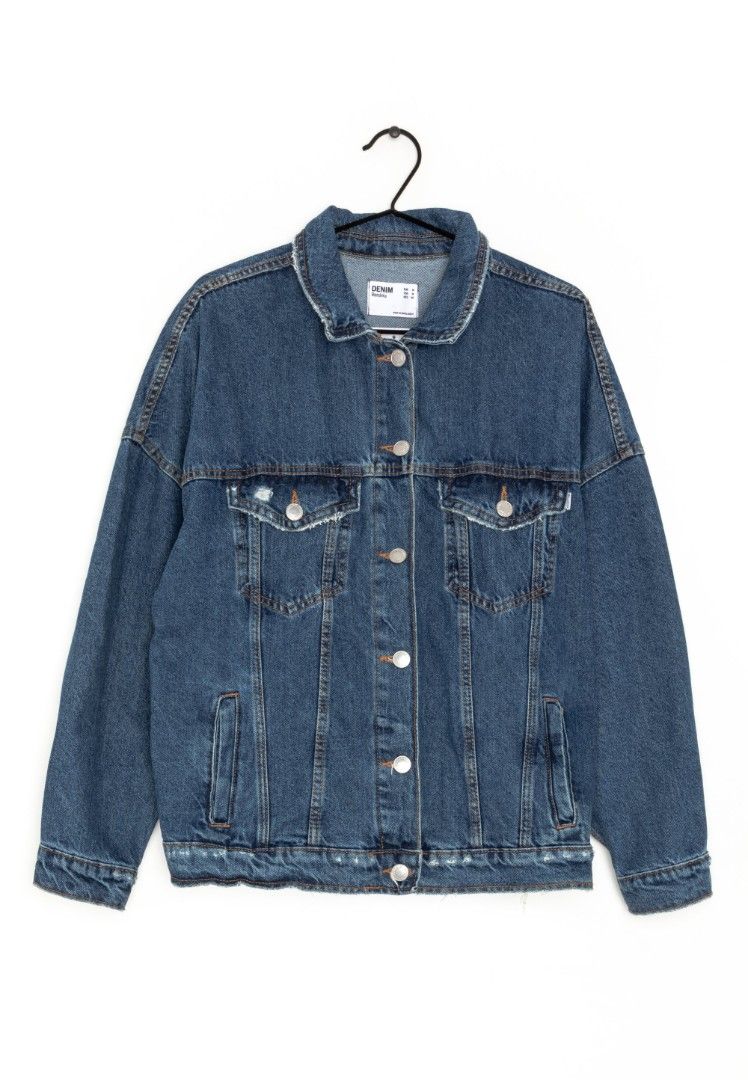 Bershka Denim Jacket Size XS (Category: Coats, Jackets and Outerwear) located in Quezon City. Submitted by epoquebyjaz (Listing ID 1470639611, Image 1). Description: - Brand: Bershka - Style: Casual oversized denim jacket - Color/Wash: Dark blue wash - Size: XS (Made in Bangladesh) - Details: Button-up front with metal hardware - Pockets: Two chest flap pockets and two side welt pockets - Edge: Trendy raw frayed hem and collar.
