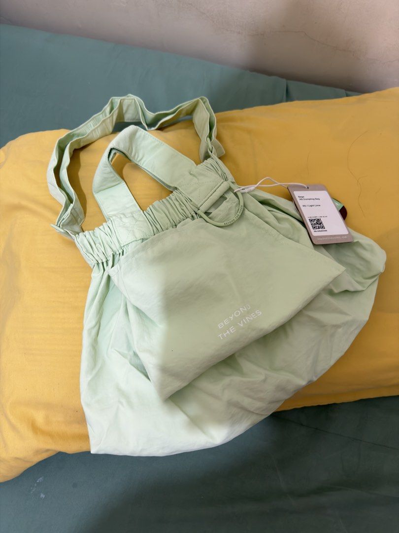 Beyond The Vines XS Dumpling Bag Light Lime (Category: Cross-body Bags) located in Calamba. Submitted by nes_936 (Listing ID 1470693578, Image 2). Description: Brand new Not used Bought from BTV online store Original price: 3790 php.