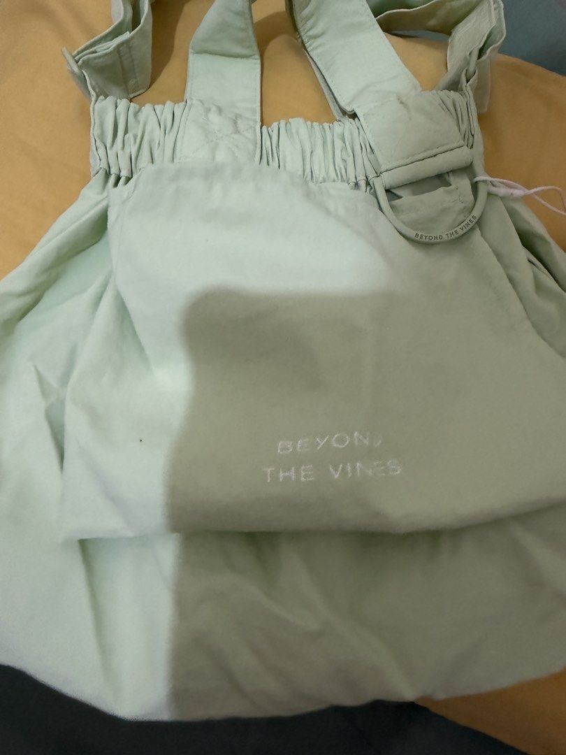 Beyond The Vines XS Dumpling Bag Light Lime (Category: Cross-body Bags) located in Calamba. Submitted by nes_936 (Listing ID 1470693578, Image 3). Description: Brand new Not used Bought from BTV online store Original price: 3790 php.