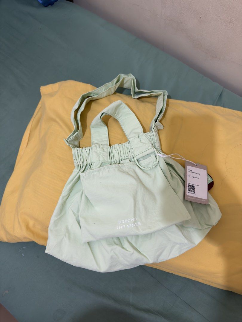 Beyond The Vines XS Dumpling Bag Light Lime (Category: Cross-body Bags) located in Calamba. Submitted by nes_936 (Listing ID 1470693578, Image 1). Description: Brand new Not used Bought from BTV online store Original price: 3790 php.