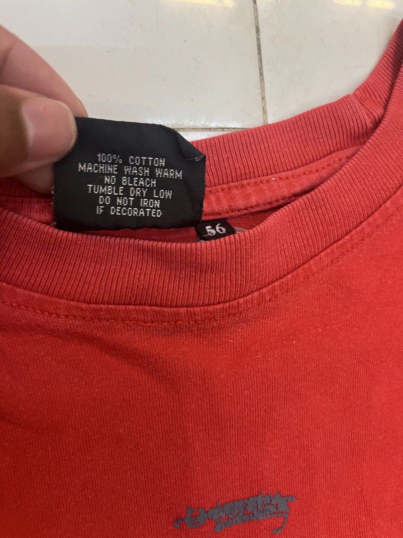 Billabong Red Graphic T-Shirt (Category: Tshirts & Polo Shirts ) located in Dagupan City. Submitted by shanadongsb (Listing ID 1470603264, Image 3). Description: - Brand: Billabong - Color: Red - Size: 56 (Relaxed oversized fit) - Material: 100% Cotton - Design: Large layered graphic print on front chest with white and charcoal logo, plus small script logo on upper back - Care: Machine wash warm.