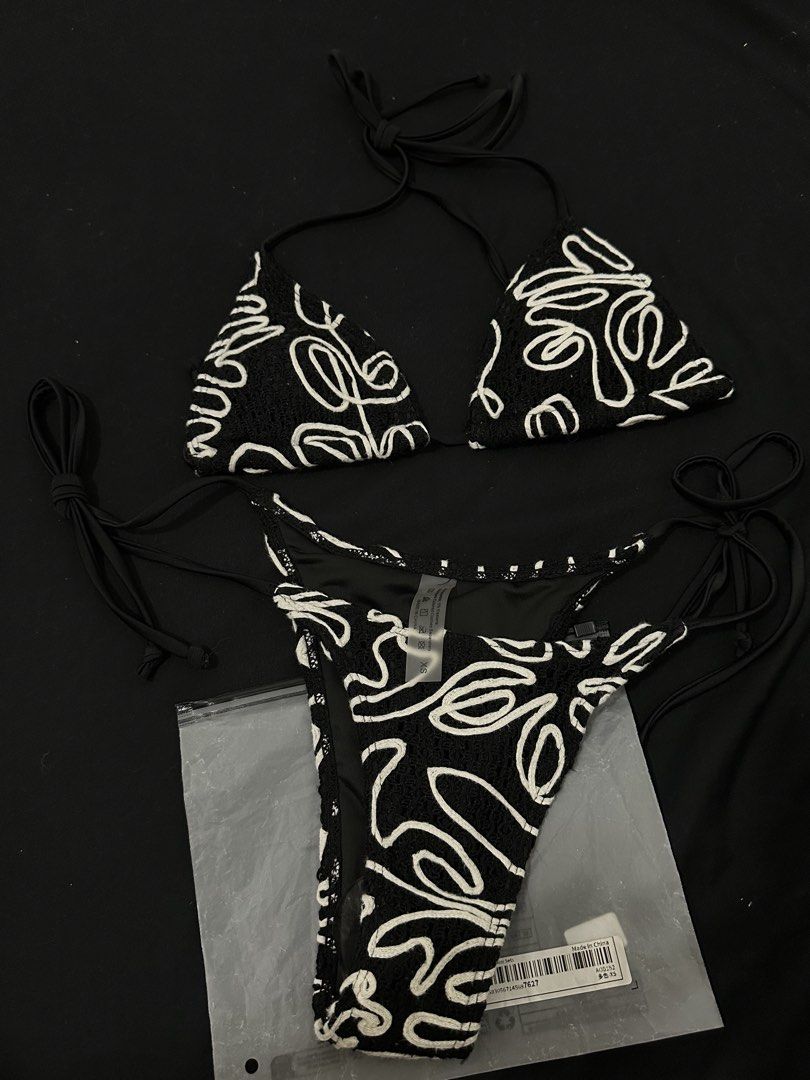 Black and White Bikini - XS (Category: Bikinis & Swimsuits) located in Las Pinas. Submitted by __aqdclttrs (Listing ID 1470615286, Image 1). Description: - Color/Design: Black with white abstract swirl embroidery - Top: Triangle halter with adjustable tie strings - Size: Extra Small (XS). Perfect for xs-small frames - Condition: Brand new with its original packaging, hygiene sticker still in place. Bought this for ₱400+ - rfs: decluttering.