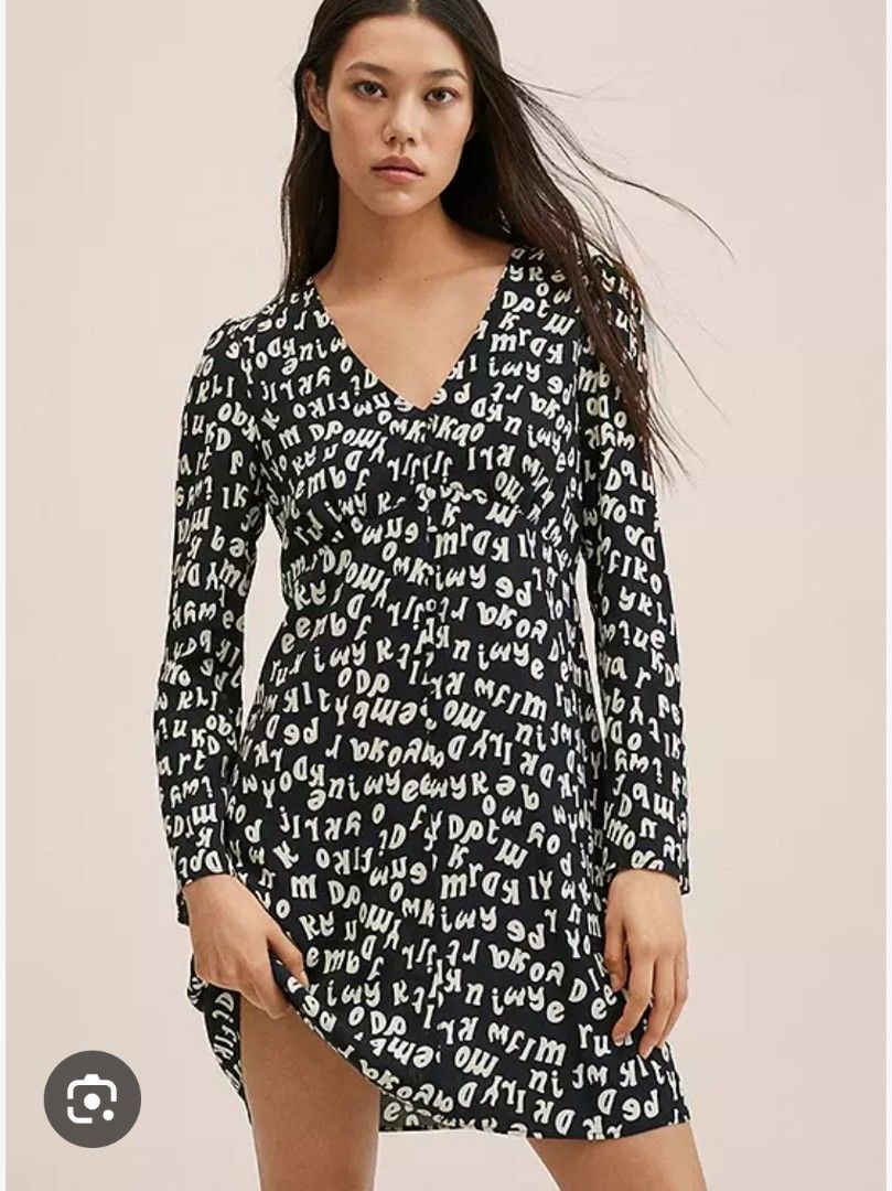 Mango Black and white letters mini dress (Category: Dresses) located in Marikina City. Submitted by dclicious2.0 (Listing ID 1470664224, Image 1). Description: Mango "Kaia" Letter Print Mini Dress • Design: Features an all-over typographic alphabet/letter print in a monochrome black and white colorway. • Silhouette: Tailored with a flattering V-neckline, long puffed/balloon sleeves, and an elastic pleated waist detail providing a fit-and-flare lo