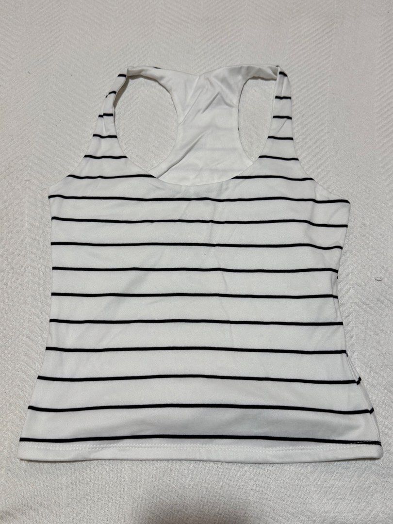 Black and white striped racerback tank top (Category: Sleeveless) located in Pateros City. Submitted by daisy03052000 (Listing ID 1470696523, Image 1). Description: .