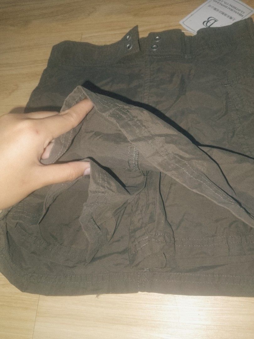 Black Cargo Skirt (Category: Babies & Kids Fashion) located in Naga. Submitted by francethriftee3 (Listing ID 1470674477, Image 3). Description: (Walang pangtali sa front) Location: Camarines Sur, Bicol - Brand new with original tags attached - Color: Black - Style: Cargo skirt with secure button closure at the waist - Extra Comfort: Built-in shorts underneath for added coverage and worry-free movement - Material: 70% nylon and 30% cotton blend f