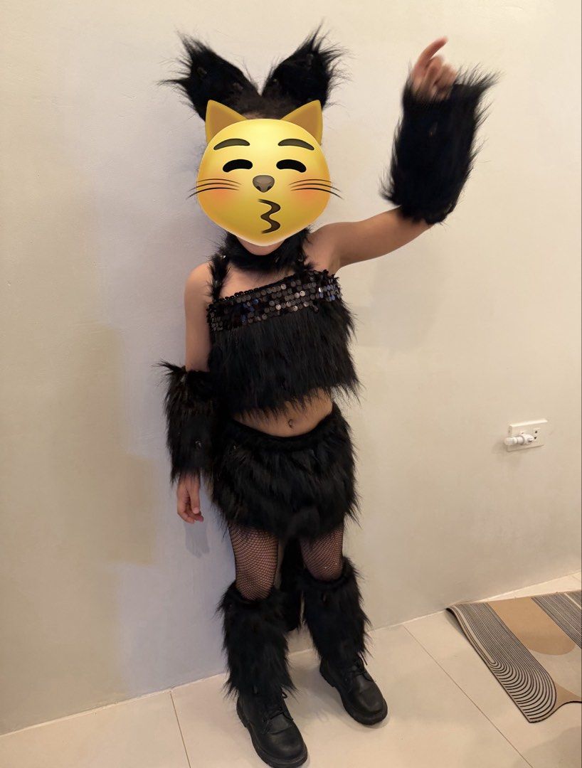 Black Cat Costume (Category: Babies & Kids Fashion) located in Manila. Submitted by ilove2ndhand02 (Listing ID 1470649405, Image 1). Description: - Complete set fluffy black cat costume set for kids (stockings not included) - Includes fuzzy crop top with trendy criss-cross back, matching shorts, and attached tail - Accessories included: cat ears headband, arm cuffs, and leg warmers - Made from ultra-soft and comfortable faux fur material - Perfec