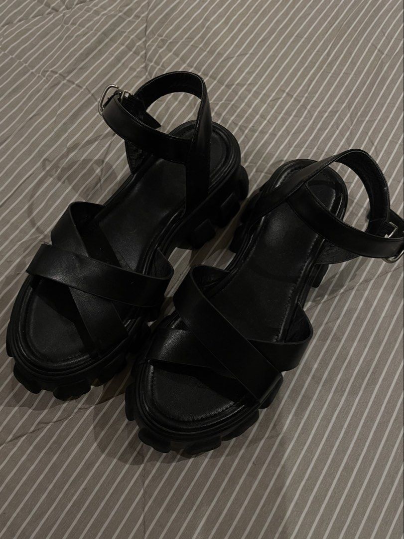 Black Chunky Lug Sole Strappy Straps Sandals (Category: Loafers) located in Las Pinas. Submitted by francesaly (Listing ID 1470724151, Image 1). Description: Trendy platform chunky sandals with criss-cross straps and adjustable ankle buckles. Gives a great height boost while keeping steps secure and comfortable!.