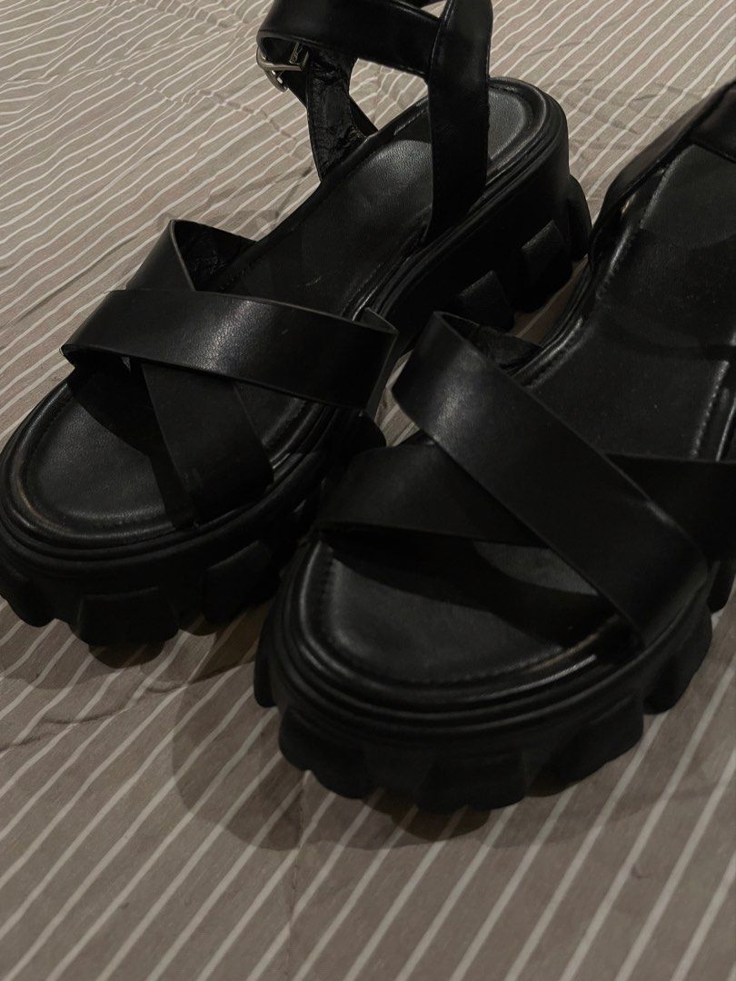 Black Chunky Lug Sole Strappy Straps Sandals (Category: Loafers) located in Las Pinas. Submitted by francesaly (Listing ID 1470724151, Image 2). Description: Trendy platform chunky sandals with criss-cross straps and adjustable ankle buckles. Gives a great height boost while keeping steps secure and comfortable!.