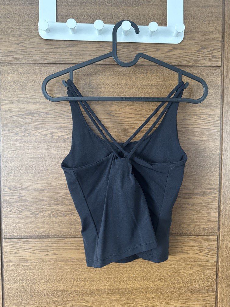 Black padded cross strapped top (Category: Others Tops) located in Manila. Submitted by namiskyumi (Listing ID 1470623389, Image 2). Description: - workout top - can be worn casually also .