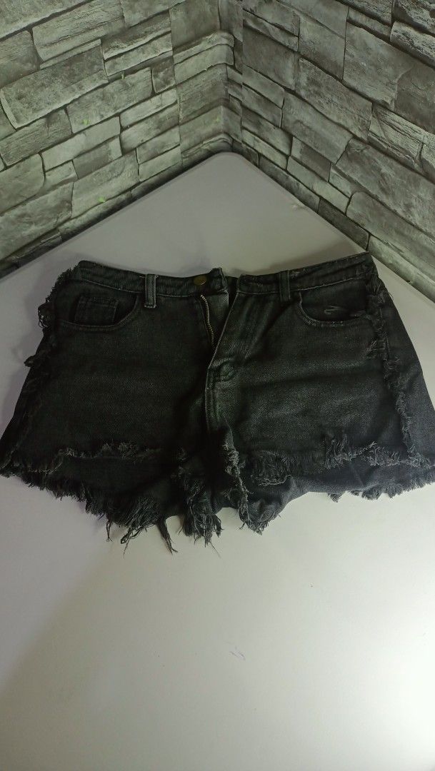 Black Denim Cut-Off Shorts (Category: Shorts) located in Antipolo. Submitted by reahespiritu (Listing ID 1470619183, Image 1). Description: - Color/Wash: Washed black - Style: Casual mid-rise denim shorts with raw frayed hems - Features: Classic five-pocket design, zipper fly, and button closure - Perfect for: Everyday warm-weather styling - Status: On hand and ready for shipping.
