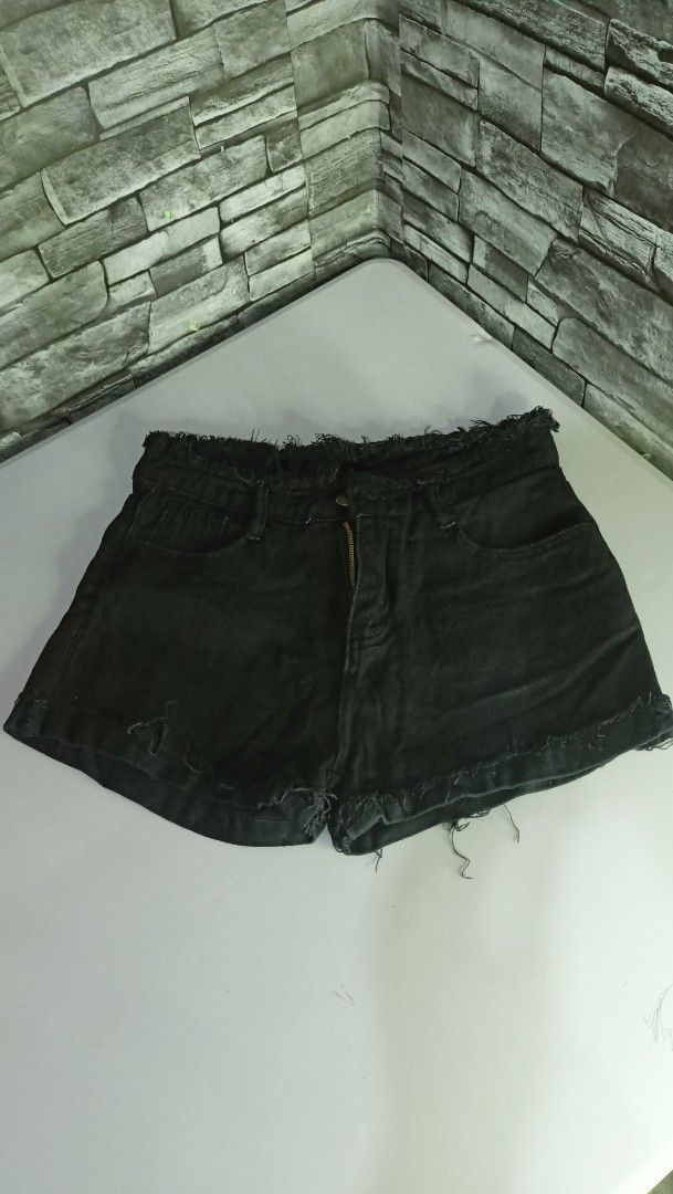 Black Denim Cut-off Shorts with Raw Hems (Category: Shorts) located in Antipolo. Submitted by reahespiritu (Listing ID 1470619775, Image 1). Description: - Color: Classic washed black - Design: Distressed raw edges at waist and hem - Closure: Zip fly with button closure - Pockets: Standard front and back pockets - Details: Includes belt loops - Condition/Use: Great wardrobe staple for casual days.