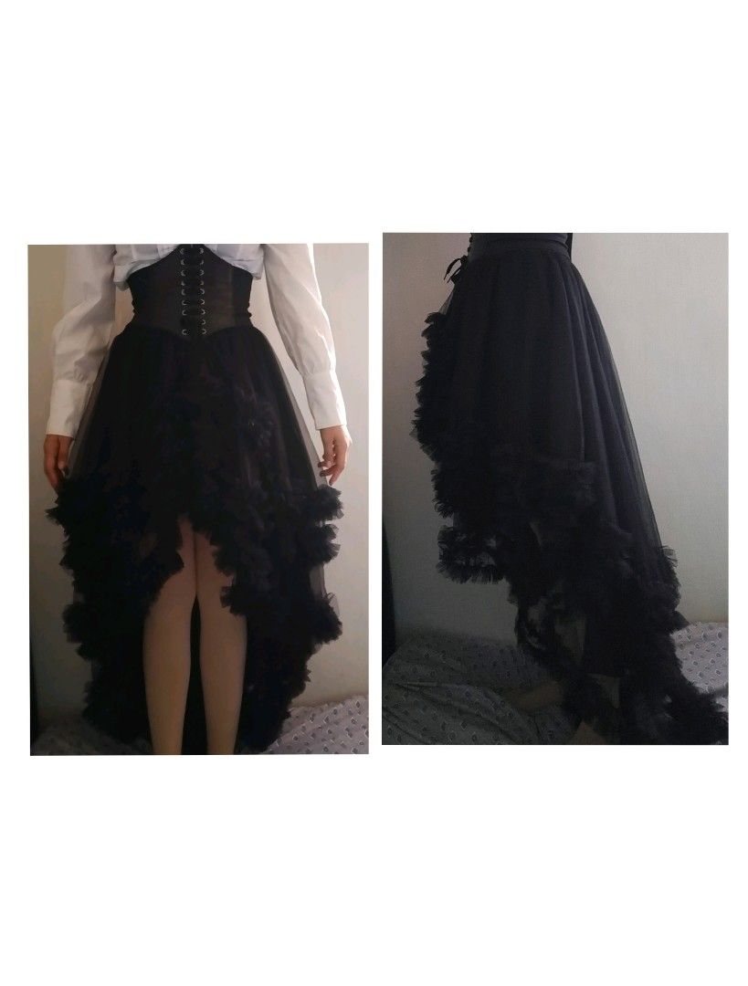 Black Gothic high-low ruffled tulle skirt (Category: Skirts) located in Santo Tomas. Submitted by zenzenzennaya (Listing ID 1470741544, Image 1). Description: - Style: Alternative fashion, gothic, costume party - Design: High-low cut, voluminous tulle layers, front ruffles, long back train - Condition: Clean fabric, great volume - Note: Shirt and corset belt not included 🧡BLACK GOTHIC HIGH-LOW SKIRT🖤 Looking for a new owner for this gorgeous as