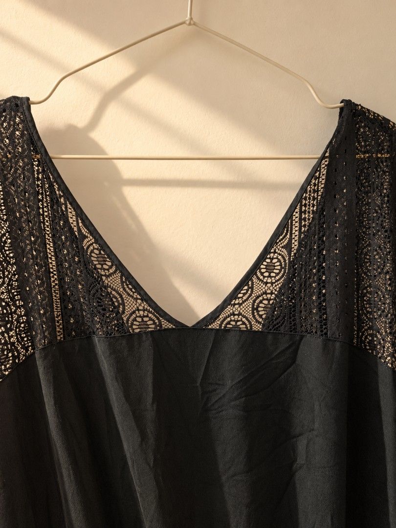 Mossimo Black Lace Trim Sleeveless Jumpsuit (Category: Jumpsuits) located in Cavite. Submitted by myprelovedpicks123 (Listing ID 1470668763, Image 2). Description: - Color: Black - Style: Sleeveless jumpsuit with wide straight legs - Details: Gorgeous lace panels on shoulders and back, V-neckline front and back - Fit: Easy slip-on style with a comfortable elastic waist - Fabric: Lightweight and breathable, perfect for warm weather or layering - C
