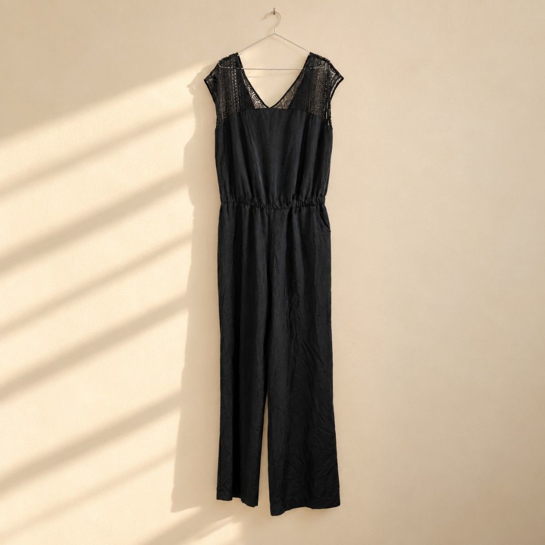 Mossimo Black Lace Trim Sleeveless Jumpsuit (Category: Jumpsuits) located in Cavite. Submitted by myprelovedpicks123 (Listing ID 1470668763, Image 1). Description: - Color: Black - Style: Sleeveless jumpsuit with wide straight legs - Details: Gorgeous lace panels on shoulders and back, V-neckline front and back - Fit: Easy slip-on style with a comfortable elastic waist - Fabric: Lightweight and breathable, perfect for warm weather or layering - C