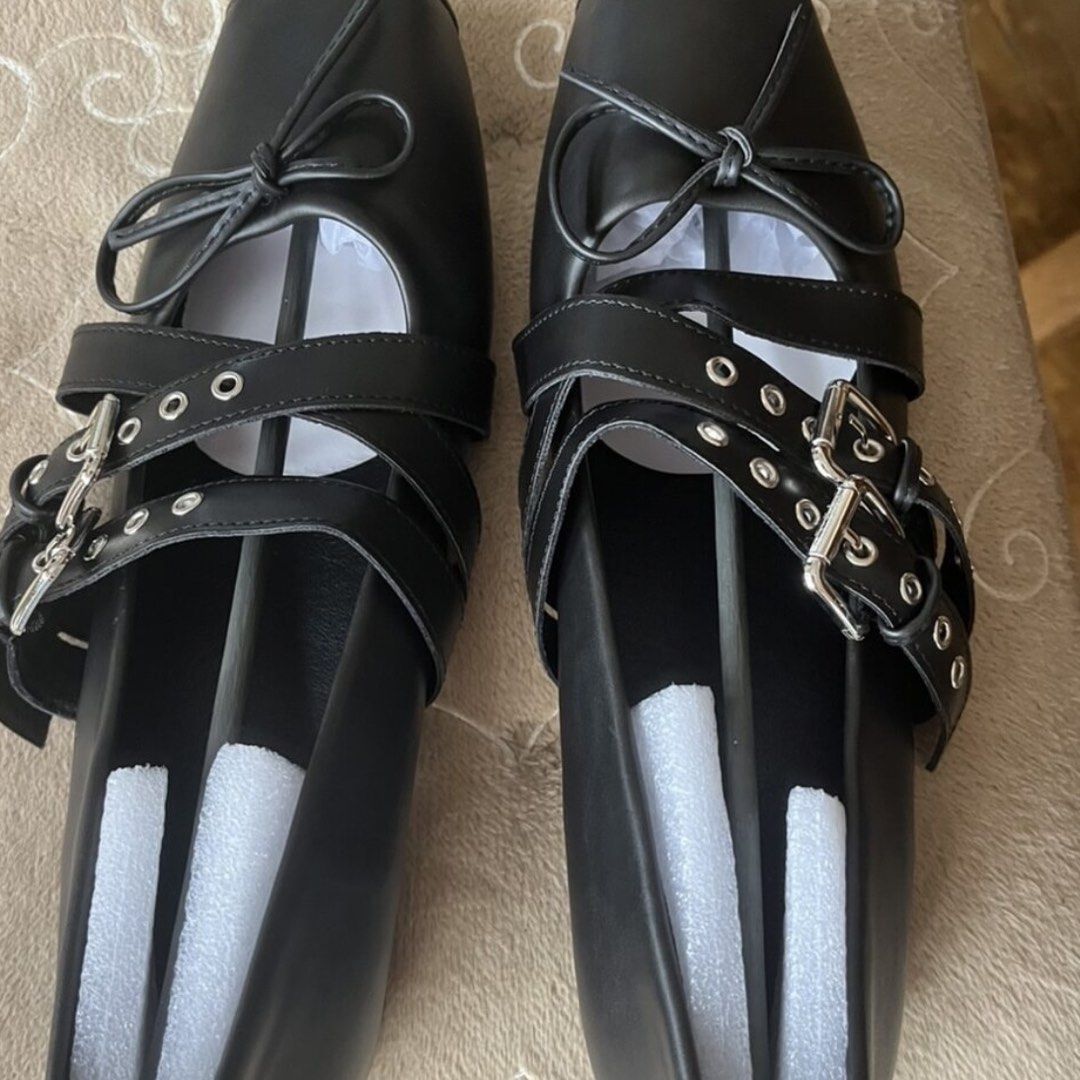 Black Mary Jane Buckle Flats with Bow (Category: Flats & Sandals) located in Dasmarinas. Submitted by ryedselling (Listing ID 1470623361, Image 3). Description: - Color: Black - Toe Style: Trendy square toe - Design: Double strap with silver metal buckles and grommet details - Accent: Cute small bow at the front - Heel: Comfortable low heel - Fit: Easy slip-on design.