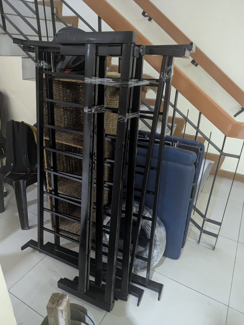 Black Metal Bed Frame Platform Slats (Category: Bed Frames & Mattresses) located in Manila. Submitted by binabanana93527 (Listing ID 1470689293, Image 2). Description: - Black metal bed frame with a strong slatted base - Full/Double 54x75 - Already dismantled and ready for quick transport - Simple bolt-together design for easy assembly - Minor paint scuffs and scratches on edges from storage (does not affect structural strength) - Perfect, budget