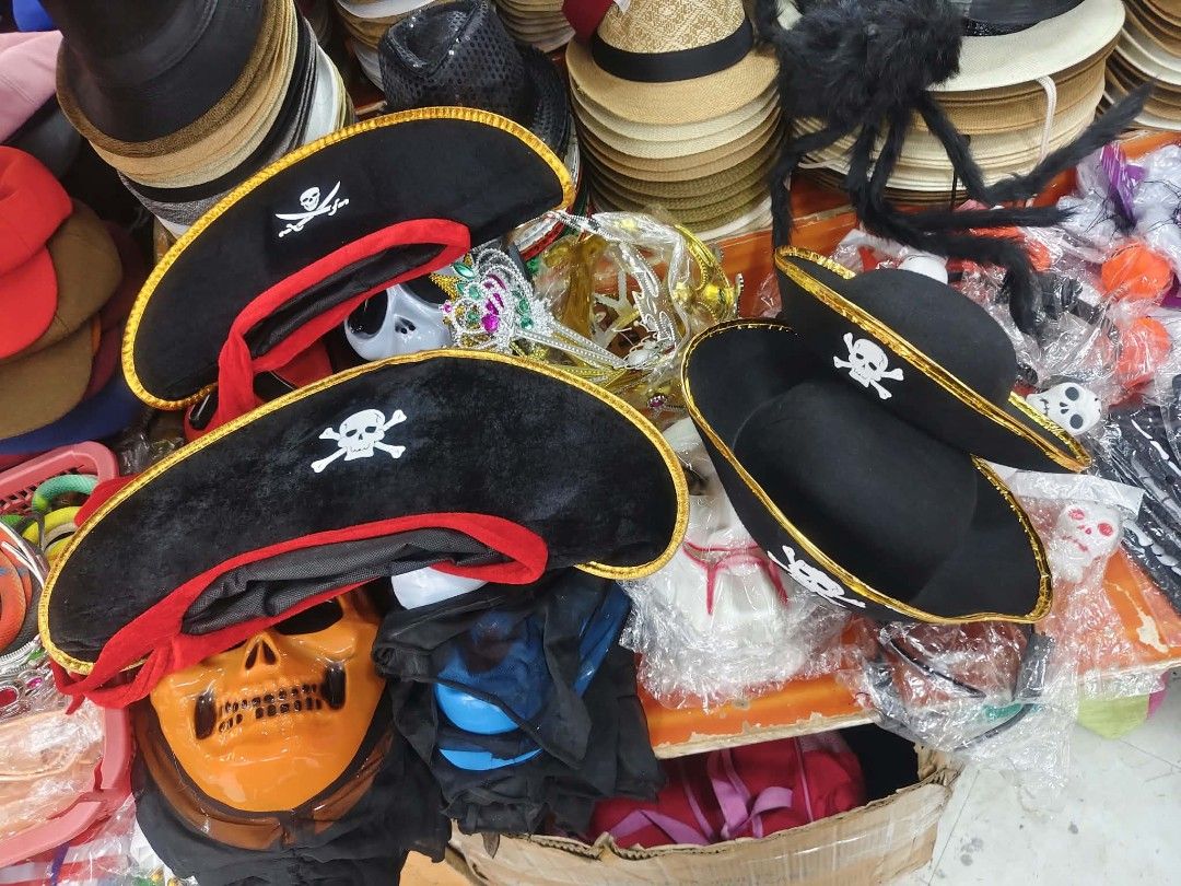 Black Pirate Hat with Skull and Crossbones (Category: Caps & Hats) located in Manila. Submitted by neojamesca55018 (Listing ID 1470616976, Image 1). Description: - Item: Pirate Hat - Design: Classic black with white skull and crossbones graphic and gold trim - Material: Felt-like - Size: Standard adult or older kids - Perfect for: Halloween parties, school plays, and dress-up.