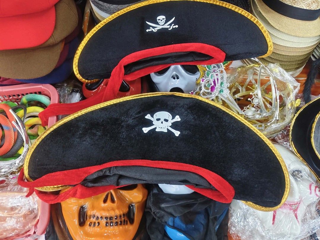 Black Pirate Hat with Skull and Crossbones (Category: Caps & Hats) located in Manila. Submitted by neojamesca55018 (Listing ID 1470616976, Image 2). Description: - Item: Pirate Hat - Design: Classic black with white skull and crossbones graphic and gold trim - Material: Felt-like - Size: Standard adult or older kids - Perfect for: Halloween parties, school plays, and dress-up.