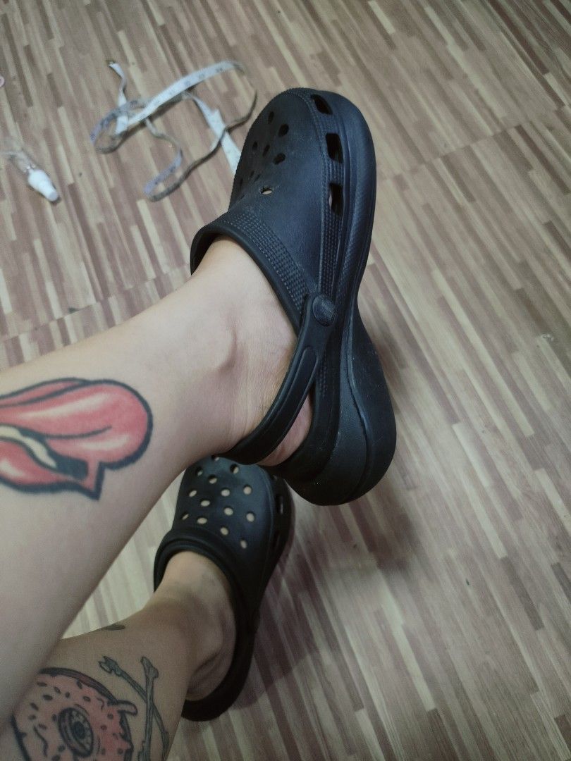 Black platform clogs chunky sole slip on shoes (Category: Wedges) located in San Jose del Monte. Submitted by helloitsmecamiel (Listing ID 1470559717, Image 1). Description: - Style: Black platform clogs with chunky heels - Comfort: Lightweight foam material with classic ventilation holes - Fit: Adjustable heel strap can be worn forward or back - Design: Textured midsole grip and easy slip-on style - Versatility: Solid black color matches any out