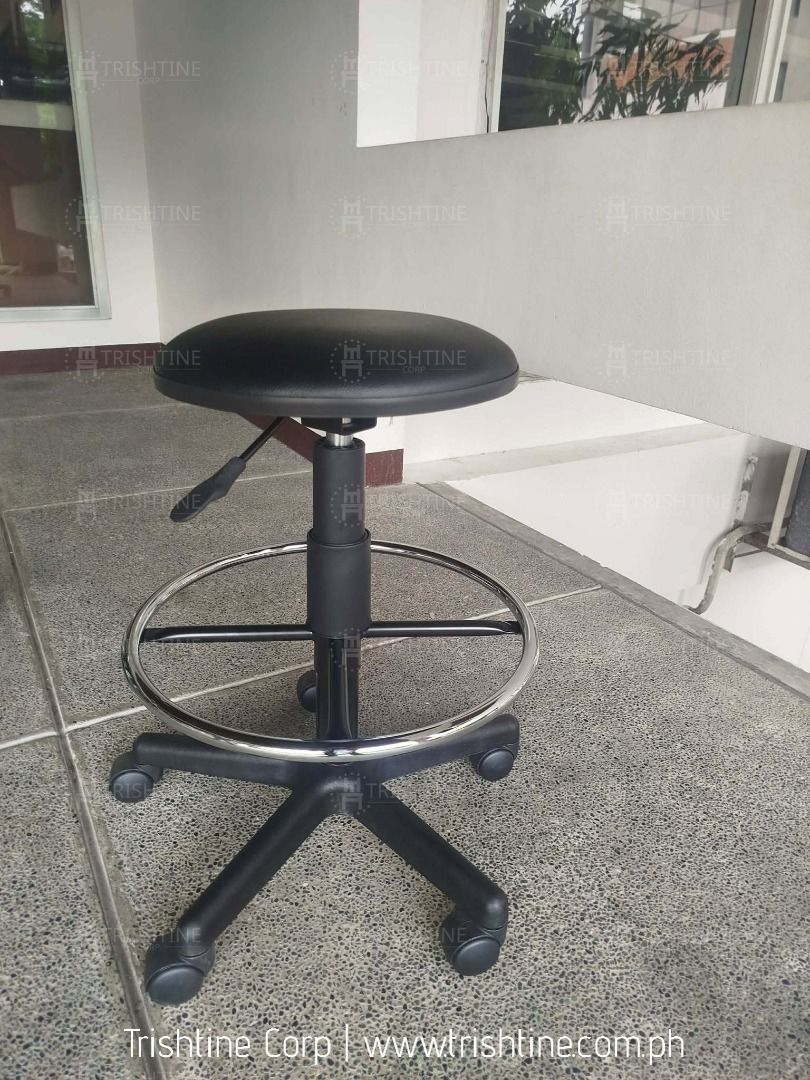 Black Rolling Drafting Stool with Foot Ring (Category: Chairs) located in Caloocan City. Submitted by jim.trishtineofficefurnitures (Listing ID 1470599761, Image 1). Description: - Color & Shape: Black round seat - Mobility: Smooth caster wheels with 5-star sturdy base - Adjustability: Easy-to-use height adjustment lever - Comfort: Built-in chrome foot ring for resting feet - Availability: 2 units in stock (message for details) DISCLAIMER: PRICE 