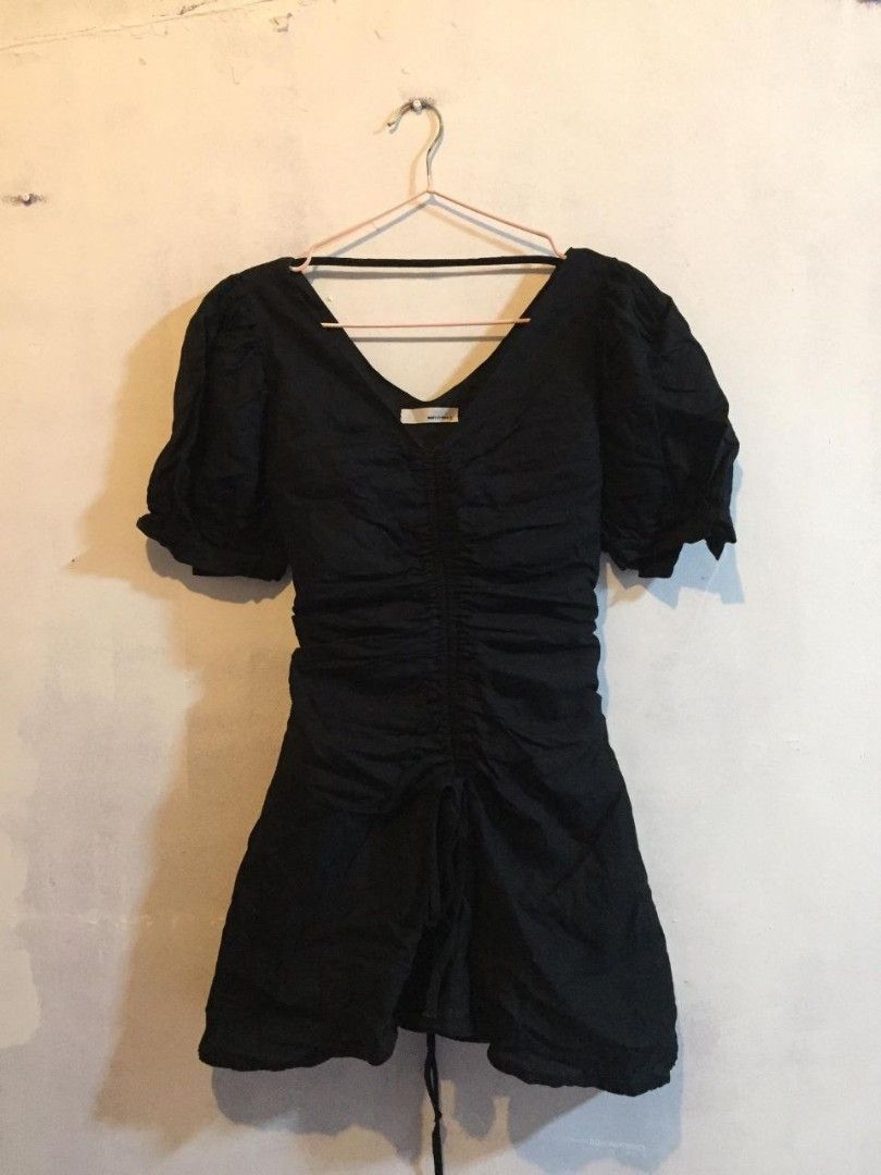 Black Ruched Puff Sleeve Mini Dress (Category: Dresses) located in Bacoor. Submitted by ksyoungieberries (Listing ID 1470692855, Image 1). Description: - Color: Black - Style: Mini dress with ruched front and adjustable drawstring hem - Neckline: V-neck - Sleeves: Short puff sleeves - Fabric: Lightweight and comfortable - Fit: True to size - Occasion: Great for going out or casual dates.