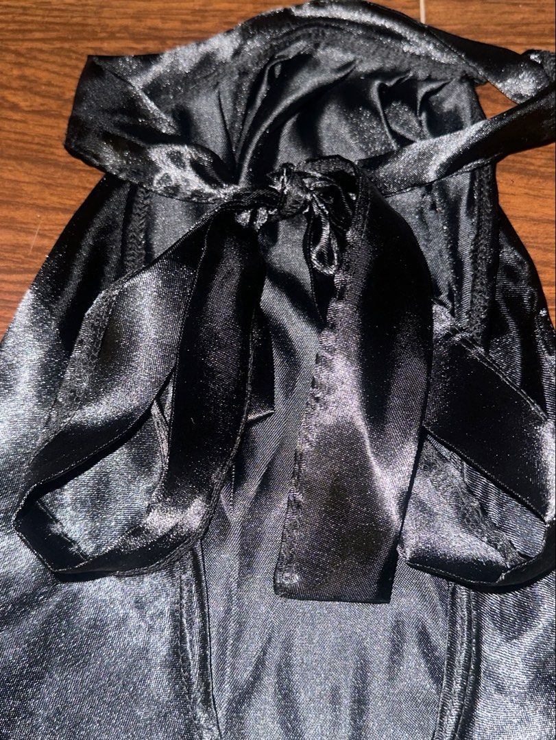 Black Satin Halter Top with Back Bow (Category: Sleeveless) located in Antipolo. Submitted by yhbc08 (Listing ID 1470614739, Image 3). Description: RFS: declutter ✨ ✅Style: Black satin halter top with a glossy, soft finish ✅Detail: Large statement bow at the back ✅Fit: Open-back design with adjustable ribbon closures ✅Perfect for: Date nights, parties, and evening events ✔️ Slight distressed fabric on the front left side, but not so noticeable wh