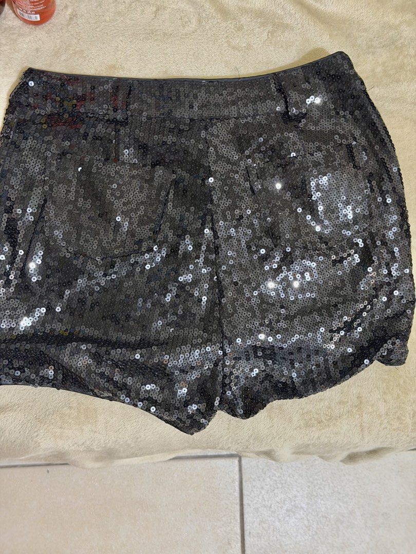 Black Sequin Sparkly Party Shorts (Category: Shorts) located in Manila. Submitted by xoxorml (Listing ID 1470697120, Image 2). Description: - Brand: Pixie Lott - Size: Waist: 30 - Design: Fully covered in black sequins on both front and back - Occasion: Ideal statement piece for parties, clubs, and nights out.