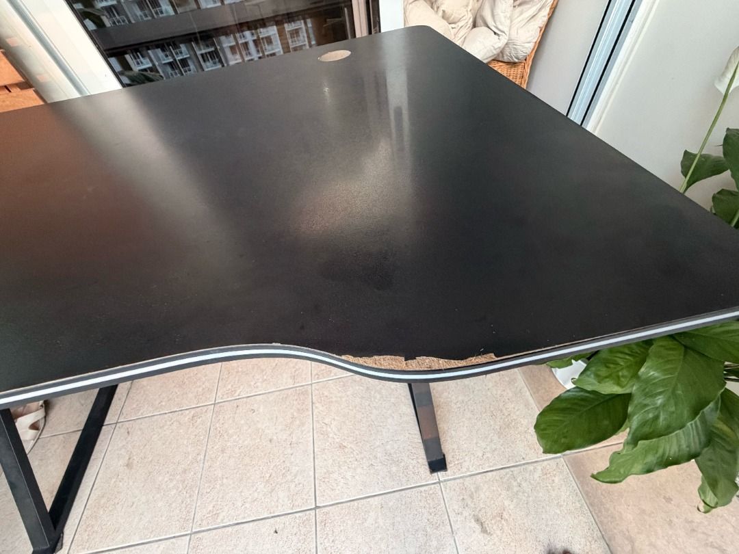 Black Study / Office / Gaming Desk (Category: Tables & Sets) located in Pasig City. Submitted by precipitation_ (Listing ID 1470583075, Image 2). Description: Black Study / Office / Gaming Desk Sturdy black desk, perfect for working from home, studying, or gaming! Dimensions: 120 cm (L) × 60 cm (W) × 75 cm (H) Color: Black Condition: Sturdy and functional. Has one small chip, but otherwise in good condition with no other damage. Original Price: ₱