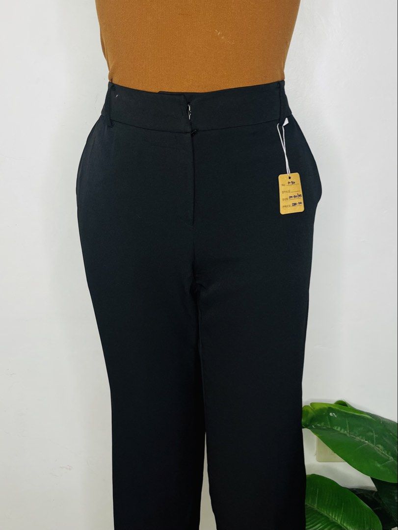Black trousers pants |size 29-30 (Category: Jeans) located in Manila. Submitted by bengirlclothing (Listing ID 1470598505, Image 3). Description: - Color: Solid black - Size: 29-30 (Length: 35) - Fit: High-waist, straight leg with tailored cut - Details: Includes belt loops and two back welt pockets - Styling: Versatile basic, easy to pair with any top for work or casual days.