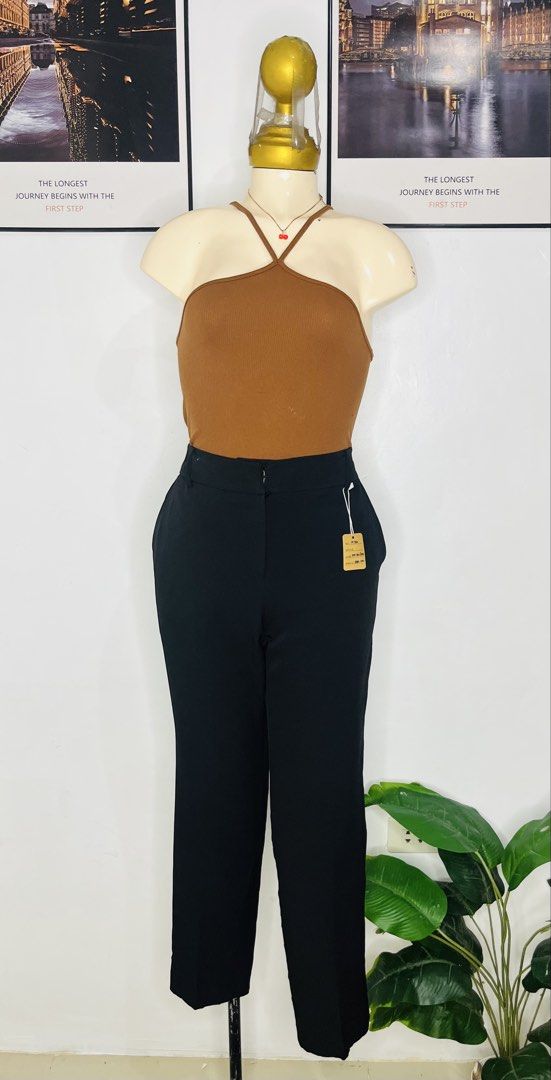 Black trousers pants |size 29-30 (Category: Jeans) located in Manila. Submitted by bengirlclothing (Listing ID 1470598505, Image 2). Description: - Color: Solid black - Size: 29-30 (Length: 35) - Fit: High-waist, straight leg with tailored cut - Details: Includes belt loops and two back welt pockets - Styling: Versatile basic, easy to pair with any top for work or casual days.
