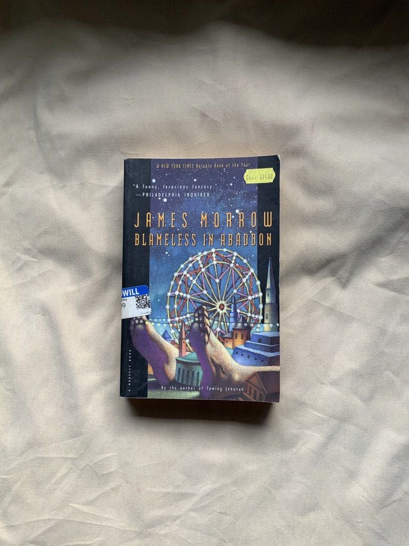 Blameless in Abaddon by James Morrow Paperback Novel (Category: Storybooks) located in Manila. Submitted by benjchpages (Listing ID 1470621951, Image 1). Description: - Title: Blameless in Abaddon by James Morrow - Edition: Harvest Book paperback - Cover Art: Surreal illustration featuring a ferris wheel and giant feet - Condition: Readable copy with intact pages, slight spine creases from reading, and original thrift store price/barcode stickers