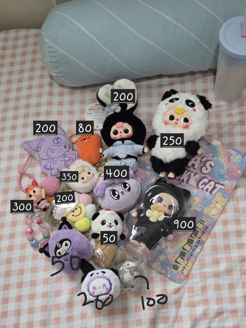 Blind Box Plush Toys & Accessories (Category: Plushies & Soft Toys) located in Antipolo. Submitted by pinkpandascloset (Listing ID 1470557601, Image 1). Description: - Items for sale: Plushies, blind box figures, and plush charms - Characters: Pandas, little dolls, and more - Price range: ₱50 to ₱900 (refer to pictures) - Condition: A mix of sealed in original packaging and unboxed items - DM for individual availability and inquiries - Some are n