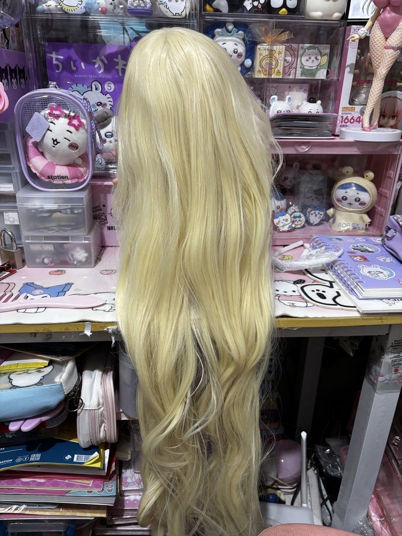 Blonde wig (Category: Hair Accessories) located in Manila. Submitted by nagusamero (Listing ID 1470688720, Image 2). Description: Na cut na noon ( bangs ) Mahaba Bawal sa maselan ‼️ No when worn pics Yan lang pics for now medyo manipis kayo nlng bahala mag style / wig fix .