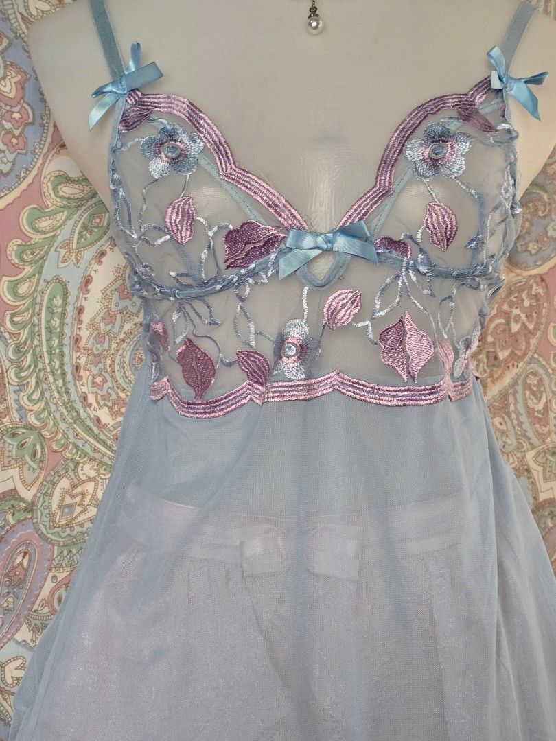 Blue embroidered mesh babydoll (Category: Undergarments & Loungewear) located in Dagupan City. Submitted by chislocker14 (Listing ID 1470598385, Image 2). Description: - Light blue sheer mesh babydoll slip - Pink & blue floral embroidery on the bodice - Adorable light blue bows on the straps and center chest - Secure hook-and-eye closure in the back - Includes matching pink ruffled lace shorts - Super dainty, comfy, and romantic style.