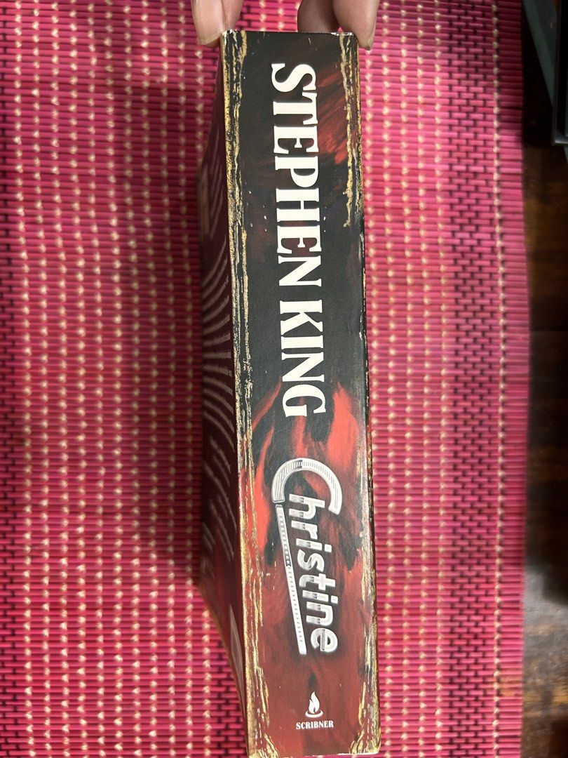BNEW! Christine Stephen King Novel Paperback (Category: Storybooks) located in Manila. Submitted by preowneddesigner (Listing ID 1470707802, Image 2). Description: - Title & Author: Christine by Stephen King - Format: Paperback edition published by ko - Plot: A thrilling story about Arnie Cunningham and a possessed 1958 Plymouth Fury - Condition: brand new remaindered copy - Perfect for: Horror fans and book collectors.