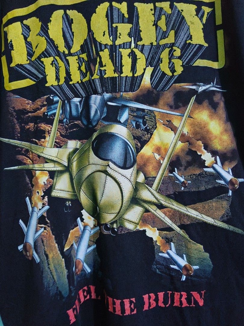 Bogey Dead 6 Feel The Burn (Category: Tshirts & Polo Shirts ) located in Taguig. Submitted by wethrifting2021 (Listing ID 1470707614, Image 3). Description: Item: Bogey Dead 6 (Reminiscent of Megadeth's Warheads on Foreheads or Wake Up Dead)🔥 ‎Size: Triple A (Artshirt Apparel & Activewear) ‎Width: 21 ‎Length: 28 ‎Condition: Excellent ‎Issue: None SWIPE MORE DETAILS. DM to purchase 📩.