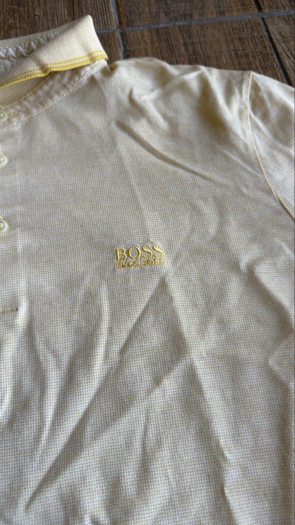 BOSS YELLOW POLO SHIRT (Category: Shirts) located in Manila. Submitted by urban.vintage (Listing ID 1470587727, Image 2). Description: ISSUE: NONE (NEED WASH) MOP :GCASH (NO COD) SHIP VIA: LALAMOVE & J&T LOCATION: PASIG CITY LENGTH: 27 WIDTH : 21.