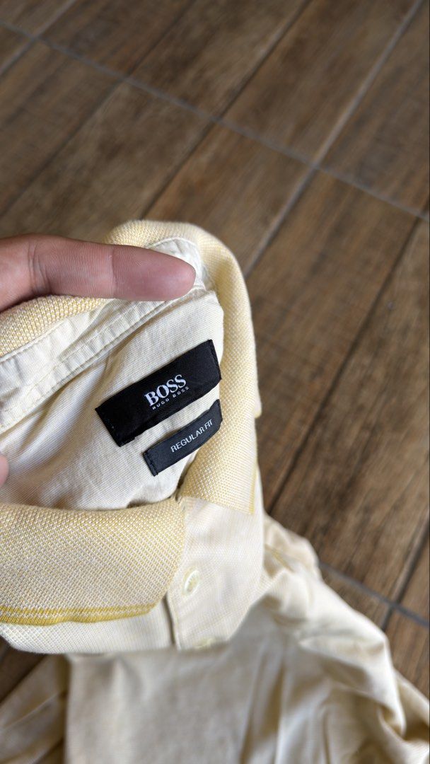 BOSS YELLOW POLO SHIRT (Category: Shirts) located in Manila. Submitted by urban.vintage (Listing ID 1470587727, Image 3). Description: ISSUE: NONE (NEED WASH) MOP :GCASH (NO COD) SHIP VIA: LALAMOVE & J&T LOCATION: PASIG CITY LENGTH: 27 WIDTH : 21.